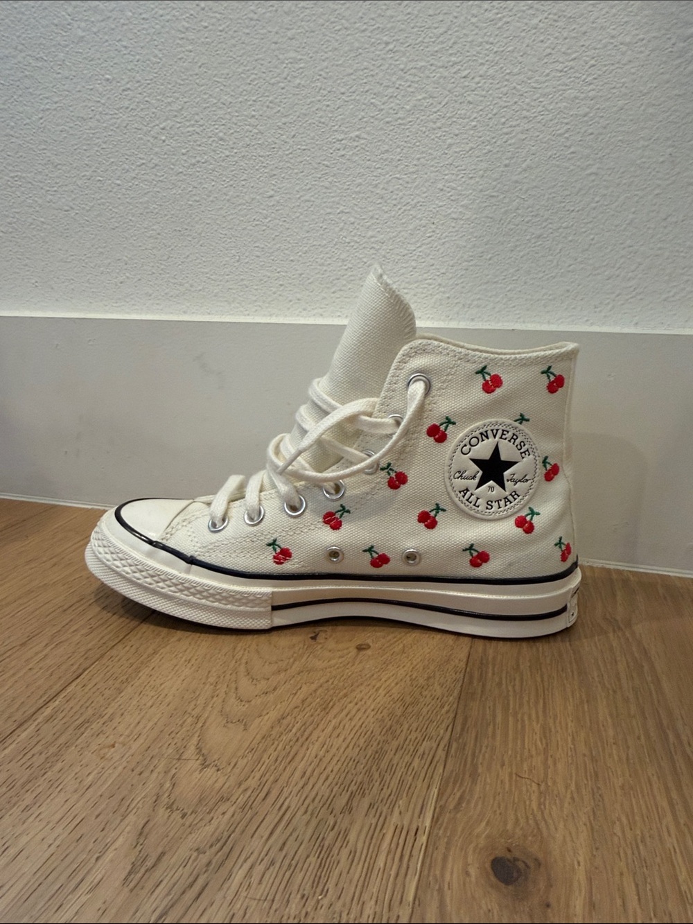 Cherry and White Converse Shoes